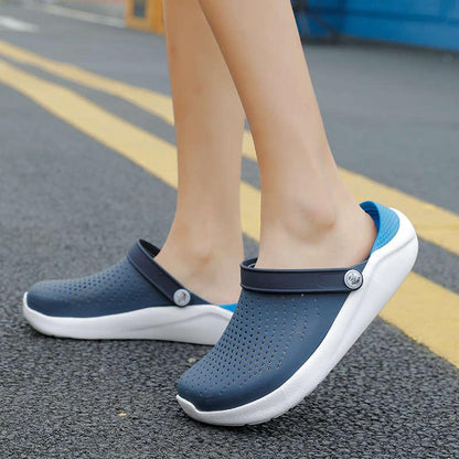 Stevvex women's blue perforated slip-on sandals with rear strap and white sole on Tampa Home & Garden Store
