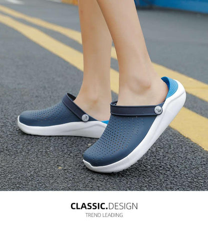 Stevvex women's blue perforated slip-on sandals with strap and button detail white sole on Tampa Home & Garden Store