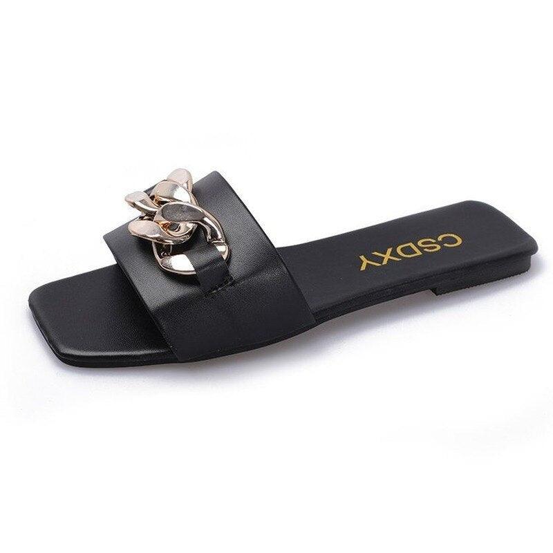 Women's black chain-embellished square-toe slide sandal; slip-on with gold chain accent Stevvex on Tampa Home & Garden Store