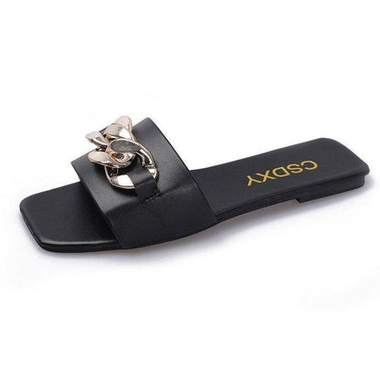 Women's black chain-embellished square-toe slide sandal; slip-on with gold chain accent Stevvex on Tampa Home & Garden Store