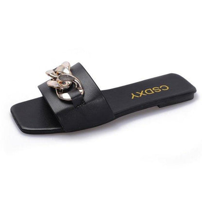 Women's Stevvex black square-toe chain slide sandal with gold chain embellishment on Tampa Home & Garden Store