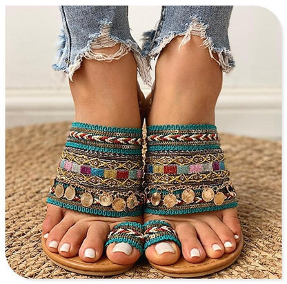 Women Stevvex flat open-toe boho sandals with turquoise woven straps and coin accents on Tampa Home & Garden Store