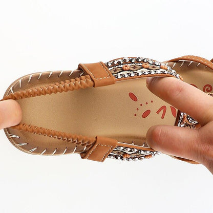 Stevvex women’s butterfly-knot rhinestone sandals with elastic ankle strap in tan on Tampa Home & Garden Store
