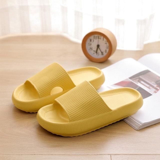 Pair of yellow EVA platform slippers with open-toe wide ribbed strap for indoor outdoor use on Tampa Home & Garden Store