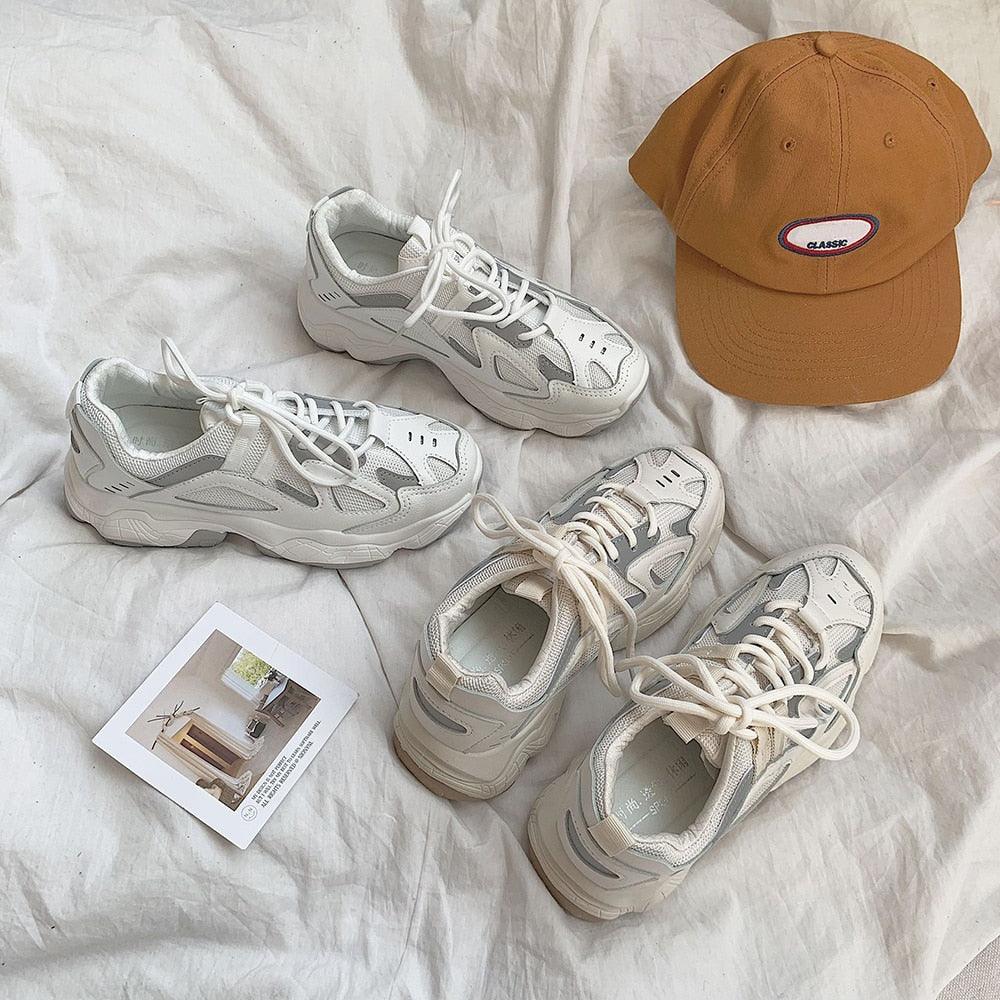 Four white chunky mesh sneakers with thick sole and lace-up design, casual women's sneakers on Tampa Home & Garden Store