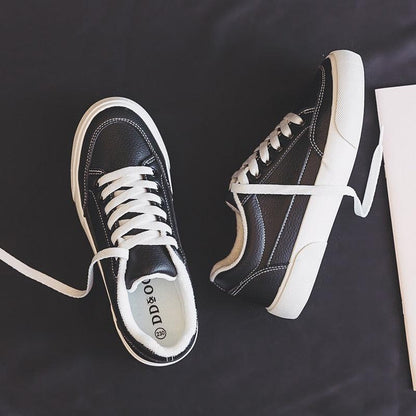 Stevvex women's black leather sneakers with white laces and sole, casual sport shoes on Tampa Home & Garden Store