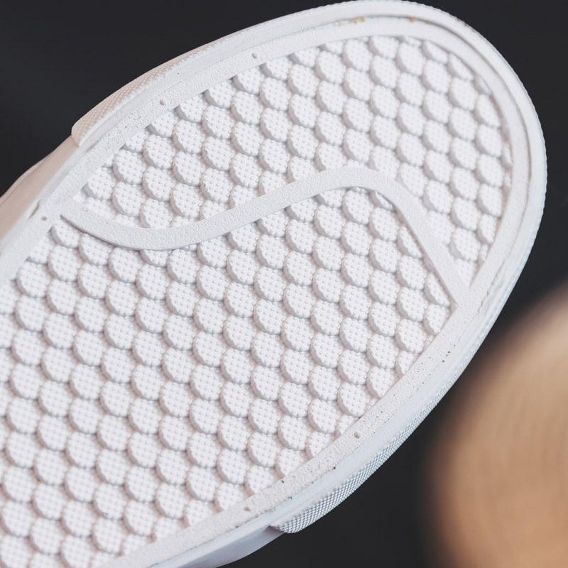 Women white Stevvex sneakers outsole close-up showing textured honeycomb sole on Tampa Home & Garden Store