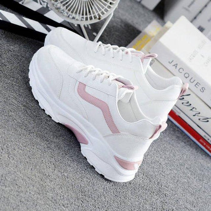 Women's white leather sneakers by Stevvex with pink side stripe, low-top lace-up, platform sole on Tampa Home & Garden Store