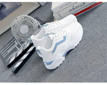 Women white leather sneakers with light blue accents, lace-up, chunky platform sole, pair on Tampa Home & Garden Store