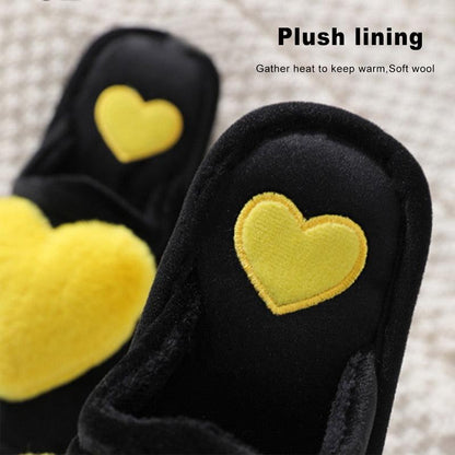 Stevvex women's black plush heart slippers with yellow embroidered heart cushioned sole on Tampa Home & Garden Store