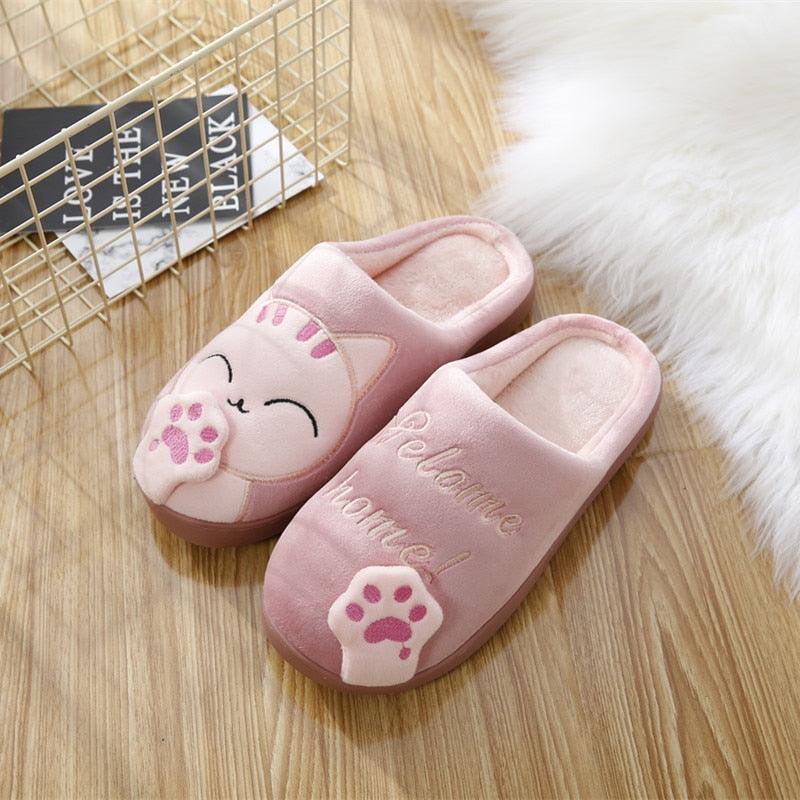 Women’s pink cat-face slippers with paw-print accents, plush lining, rubber sole on Tampa Home & Garden Store
