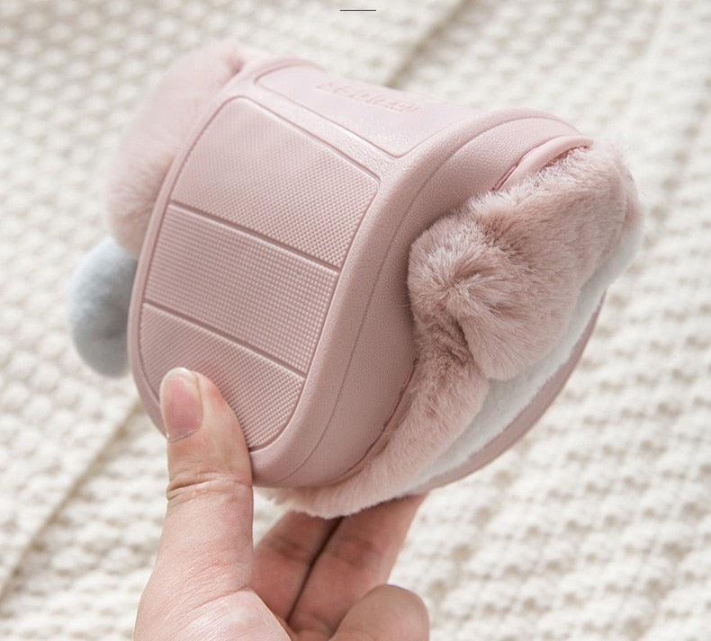 Women’s Stevvex pink plush winter slippers with fuzzy lining and non-slip sole close-up view on Tampa Home & Garden Store