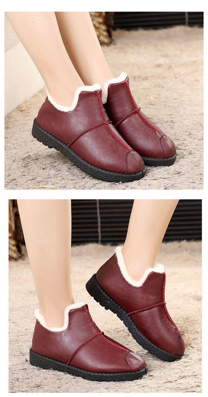 Stevvex burgundy faux leather fur-lined booties with white plush trim and black sole on Tampa Home & Garden Store
