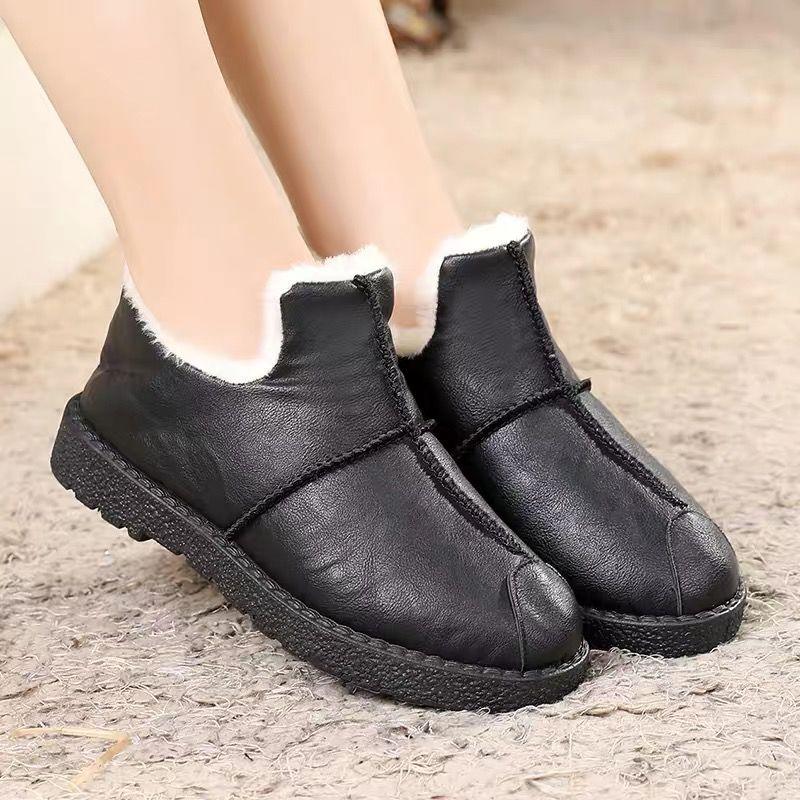 Stevvex women's black leather winter boots with plush fur lining and non-slip sole on Tampa Home & Garden Store