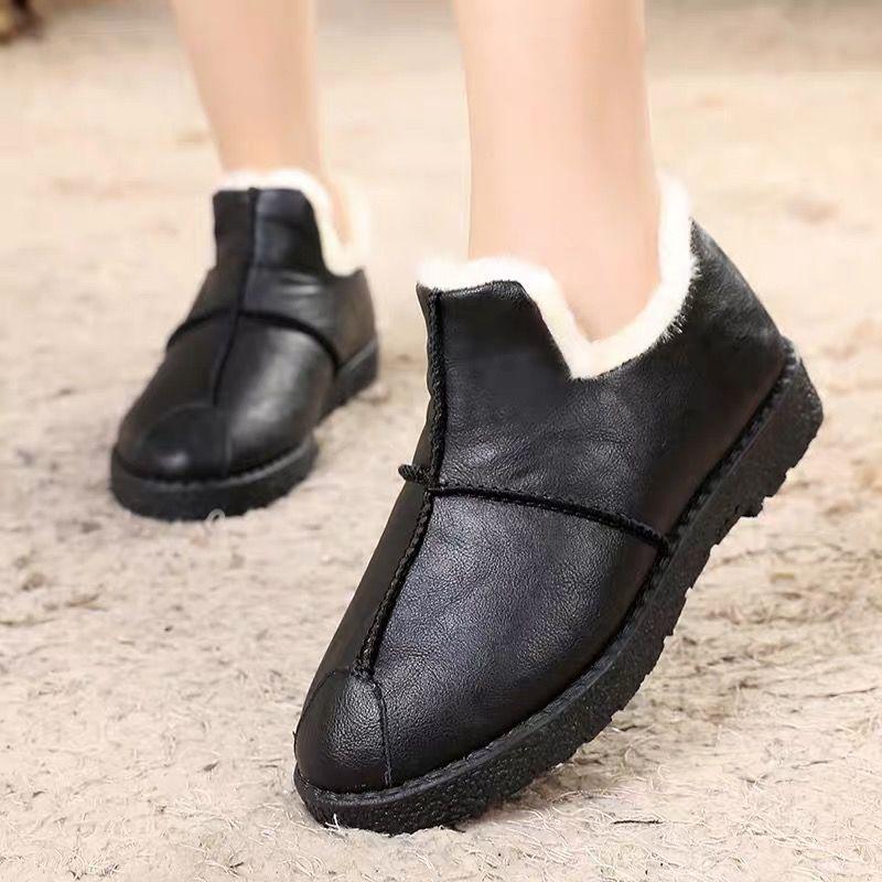 Stevvex black leather winter boots with white plush lining and non-slip sole pair on Tampa Home & Garden Store