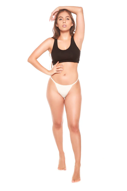 Women's bikini-style underwear on model; white bikini bottoms paired with black top on Tampa Home & Garden Store