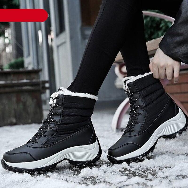 Stevvex womens waterproof winter boots, black with fur trim, lace-up ankle height, non-slip sole on Tampa Home & Garden Store