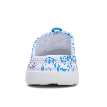 Womens Stevvex white blue leaf-pattern slip-on clogs, breathable beach slippers back view on Tampa Home & Garden Store