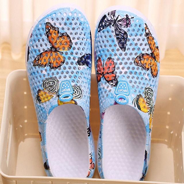 Womens butterfly-print slip-on sandals blue breathable water shoes pair on Tampa Home & Garden Store