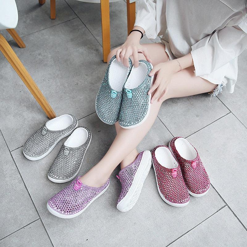 Stevvex womens casual breathable slip-on clogs blue worn pair with gray purple several pairs on floor on Tampa Home & Garden Store