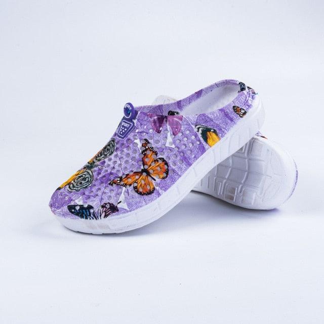 Stevvex women's butterfly floral purple clogs, lightweight slip-on slippers with white sole on Tampa Home & Garden Store