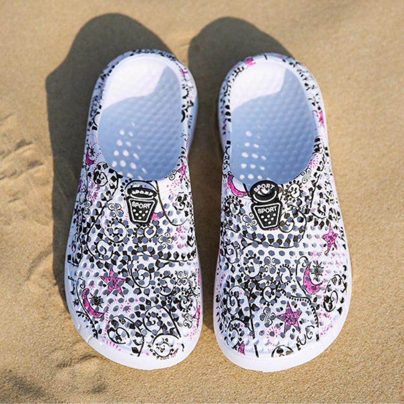 Women's casual clogs beach sandals white slip-ons with floral pattern lightweight Stevvex pair on Tampa Home & Garden Store