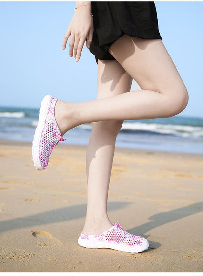 Womens casual slip-on beach slippers Stevvex pink floral mesh upper white sole pair on Tampa Home & Garden Store