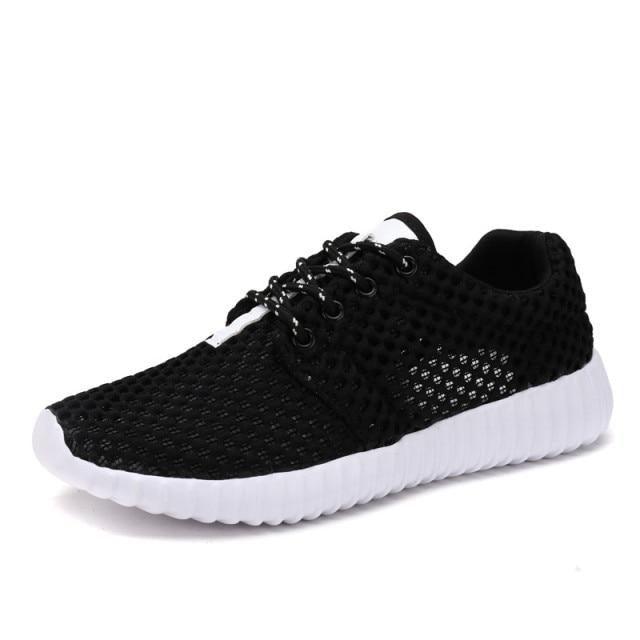 Stevvex women's breathable mesh lace-up athletic sneakers black with white sole on Tampa Home & Garden Store