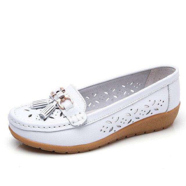 Womens white leather flats with tassel detail, perforated side panels, tan sole Stevvex on Tampa Home & Garden Store