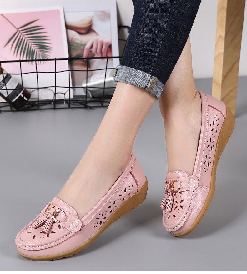 Stevvex pink women's slip-on flats with floral cutouts and tassel accents on Tampa Home & Garden Store