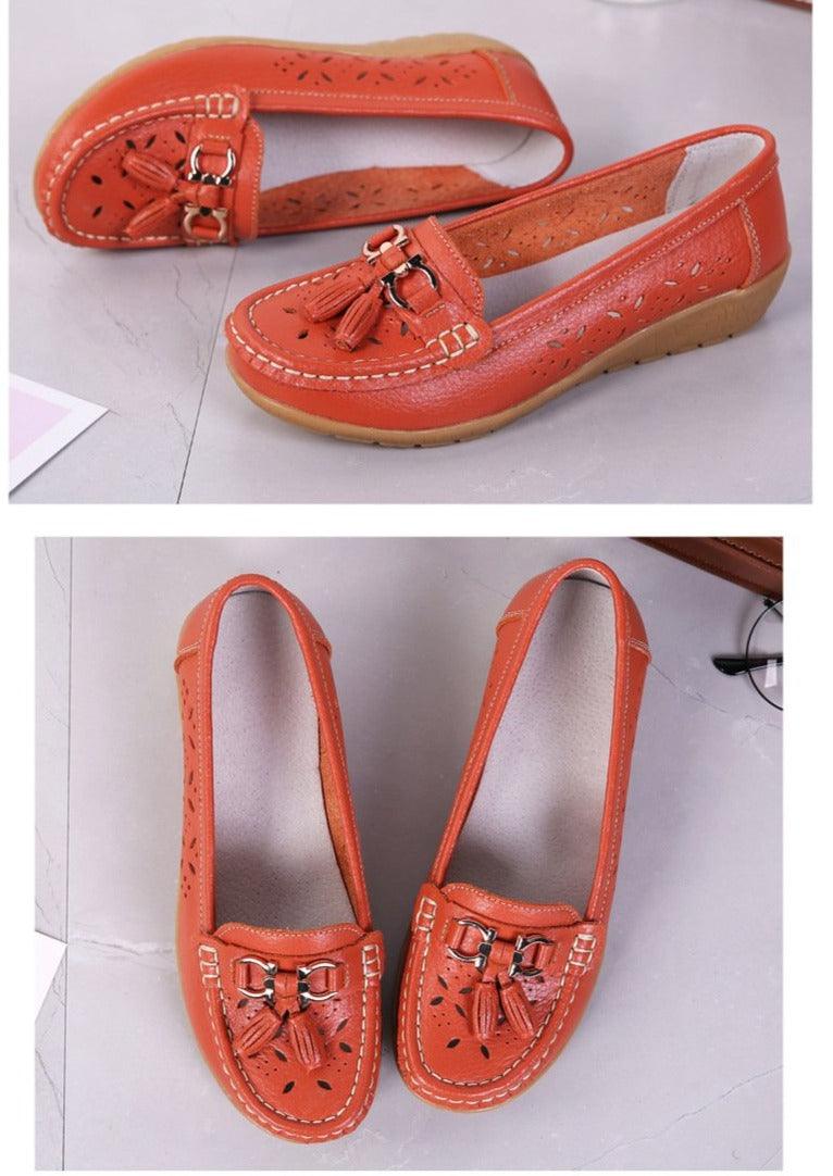 Stevvex women's orange leather flats with tassel buckles and perforated sides on Tampa Home & Garden Store