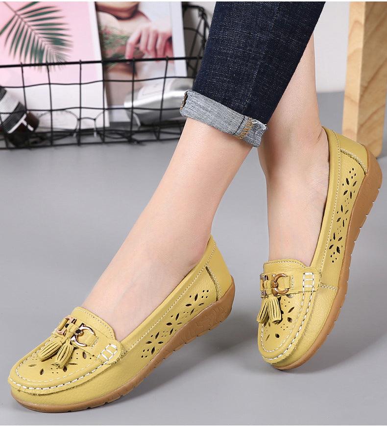 Stevvex yellow genuine leather flats with tassel fringe and perforated side cutouts on Tampa Home & Garden Store