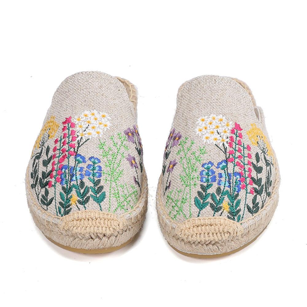 Hemp slide slippers by Stevvex in beige fabric with colorful floral embroidery, pair on Tampa Home & Garden Store
