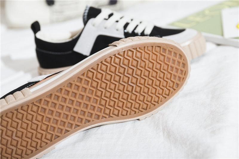 Stevvex womens canvas sneakers with beige sole and black and white upper casual slip-on on Tampa Home & Garden Store