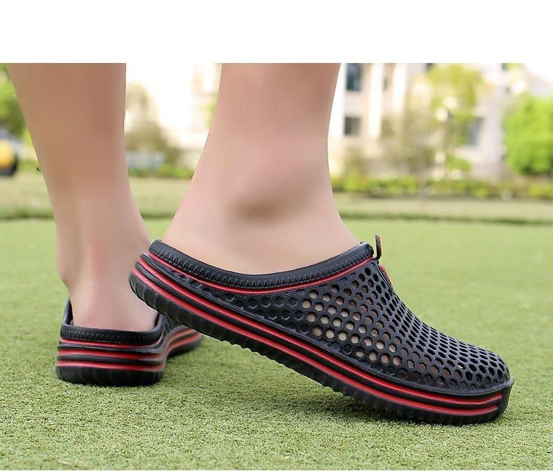 Womens black perforated sandals with red stripe midsole, breathable EVA garden clogs on Tampa Home & Garden Store