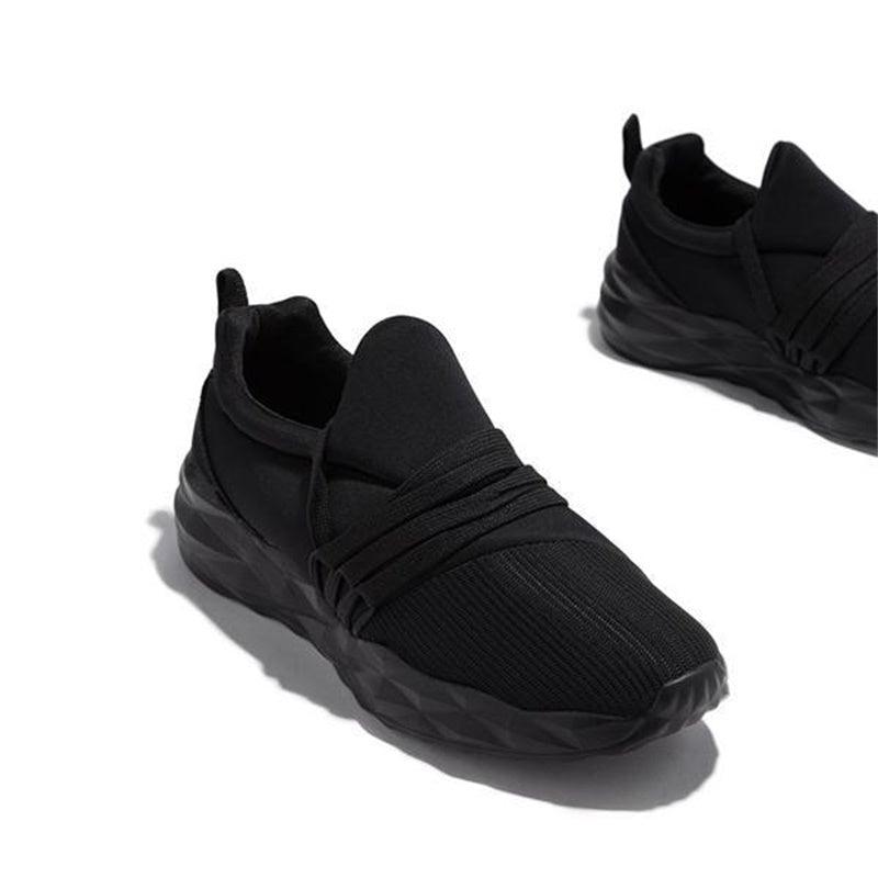 Stevvex womens black knit sneakers with wrapped midfoot strap and chunky outsole pair on Tampa Home & Garden Store