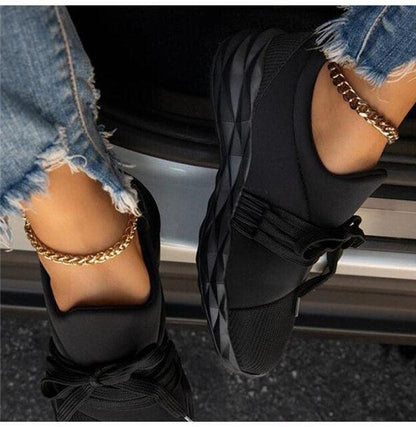 Womens Stevvex black sneakers with strap detail and chunky vulcanized sole pair on Tampa Home & Garden Store