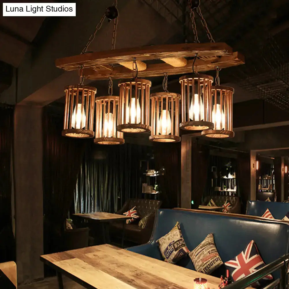 Wood Industrial Island Light pendant fixture with six wooden cage pendants in warm glow on Tampa Home & Garden Store