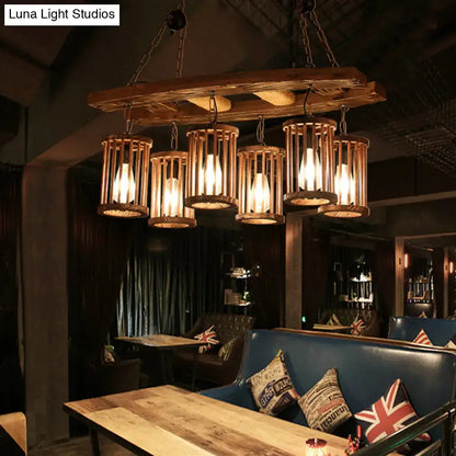 Wood Industrial Island Light pendant fixture with six wooden cage pendants in warm glow on Tampa Home & Garden Store