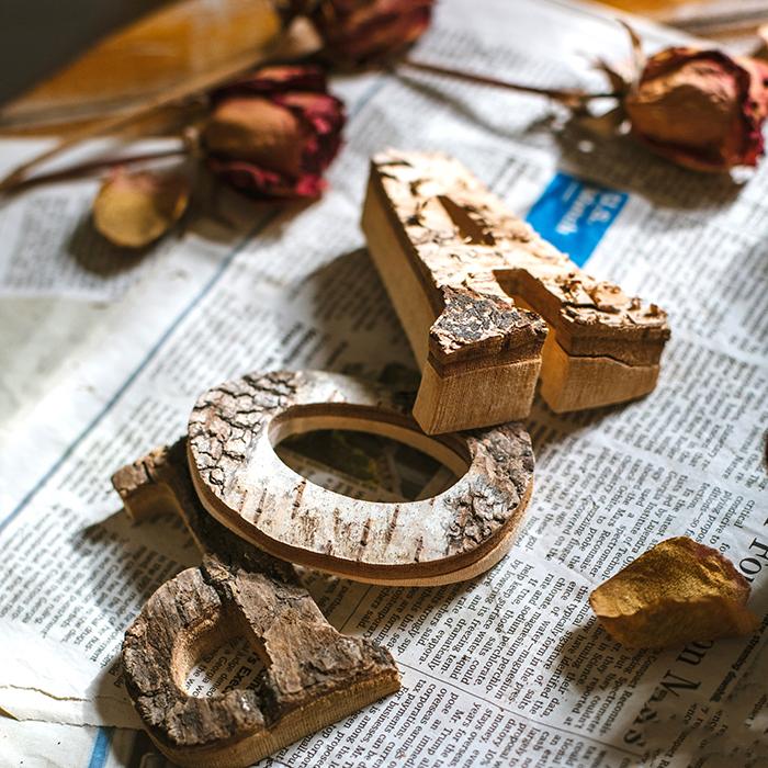 Wooden alphabet letter blocks and ring pieces with natural bark texture, RusticReach on Tampa Home & Garden Store