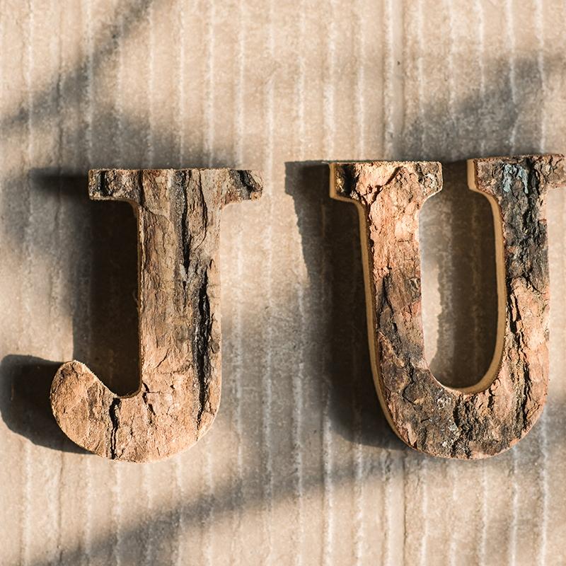 Wooden alphabet letters J and U with rustic bark texture RusticReach on Tampa Home & Garden Store