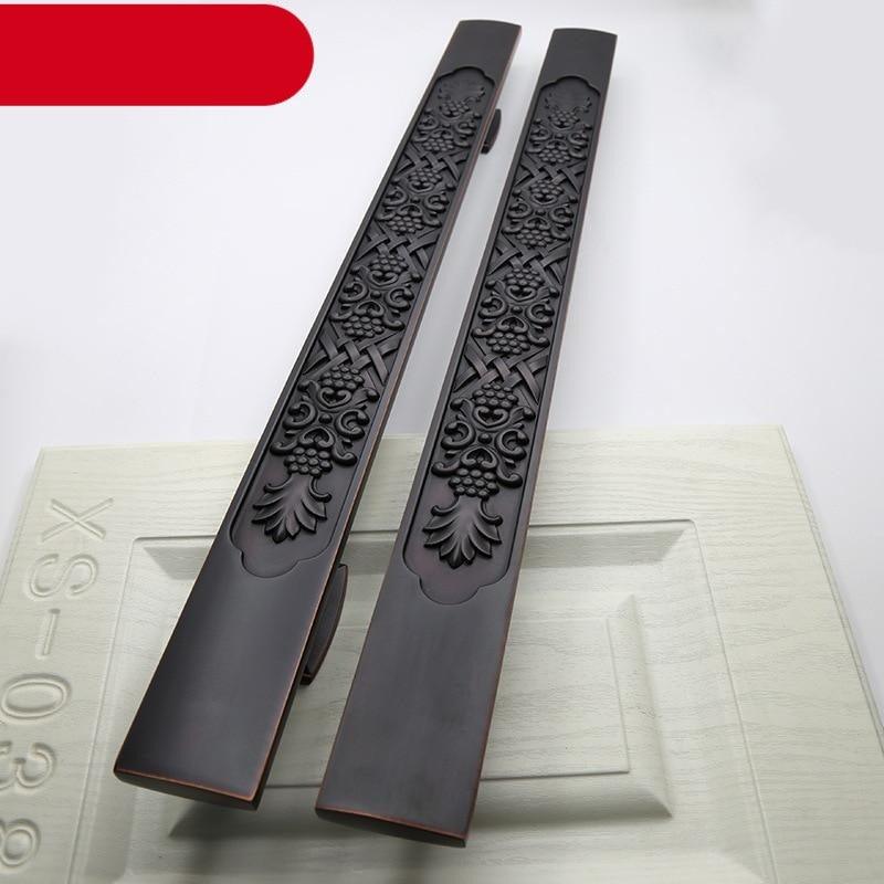 Wooden door pull handle in black with ornate floral relief, Stevvex antique style pair on Tampa Home & Garden Store