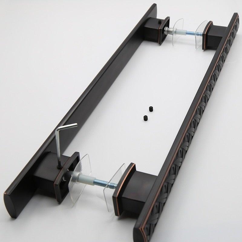 Wooden door barn pull handle set in antique black with surface-mount hardware on Tampa Home & Garden Store