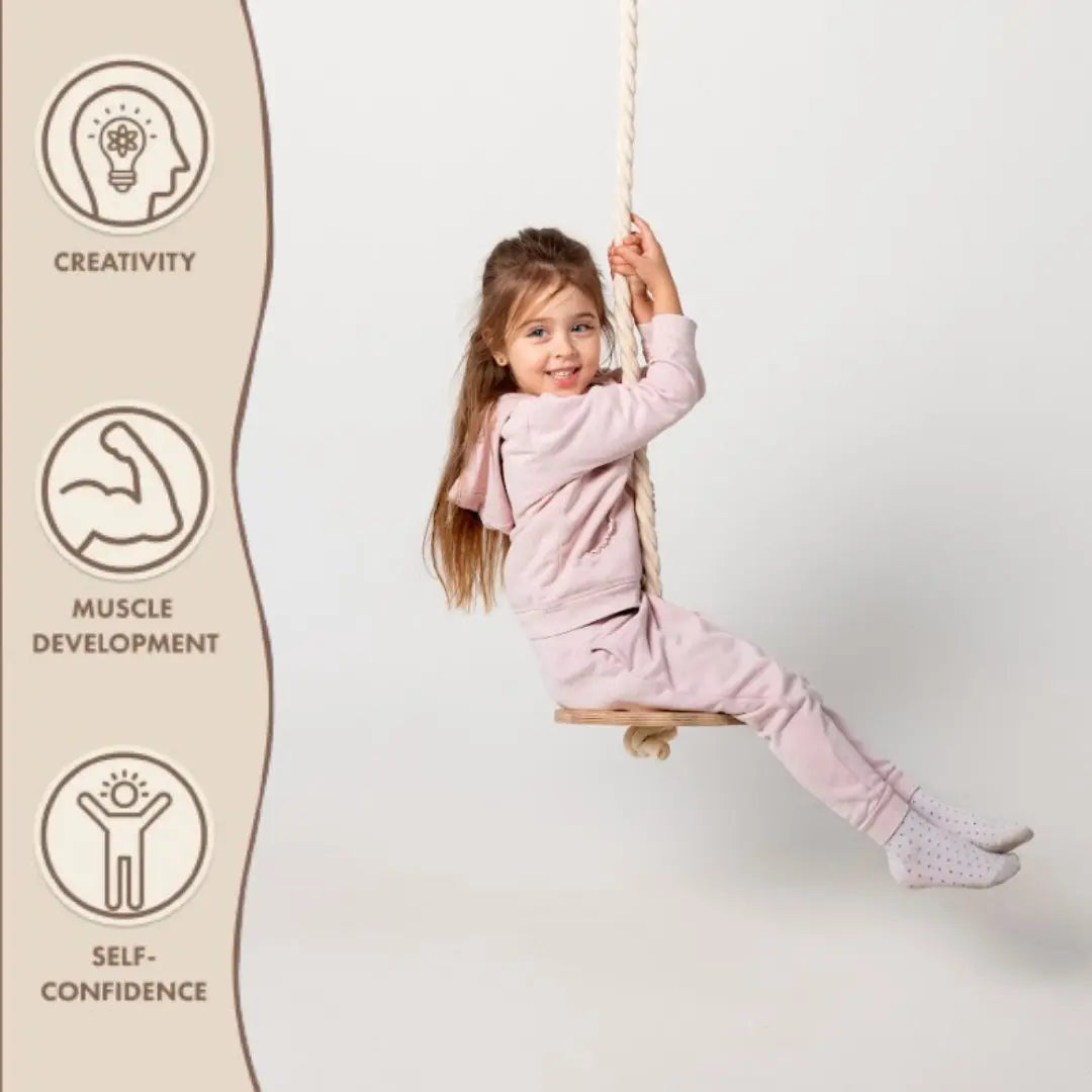 Goodevas wooden rope swing for kids with natural wood seat and thick rope, child in pink swinging on Tampa Home & Garden Store