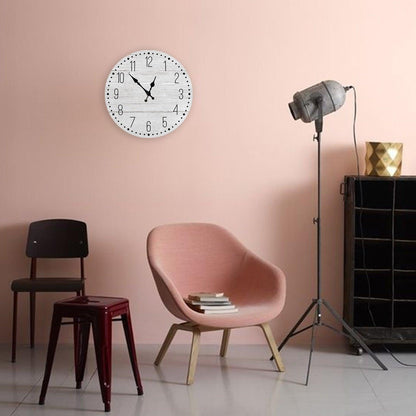 Stevvex wooden wall clock 10 inch with white dial and black numerals for living space on pink wall on Tampa Home & Garden Store