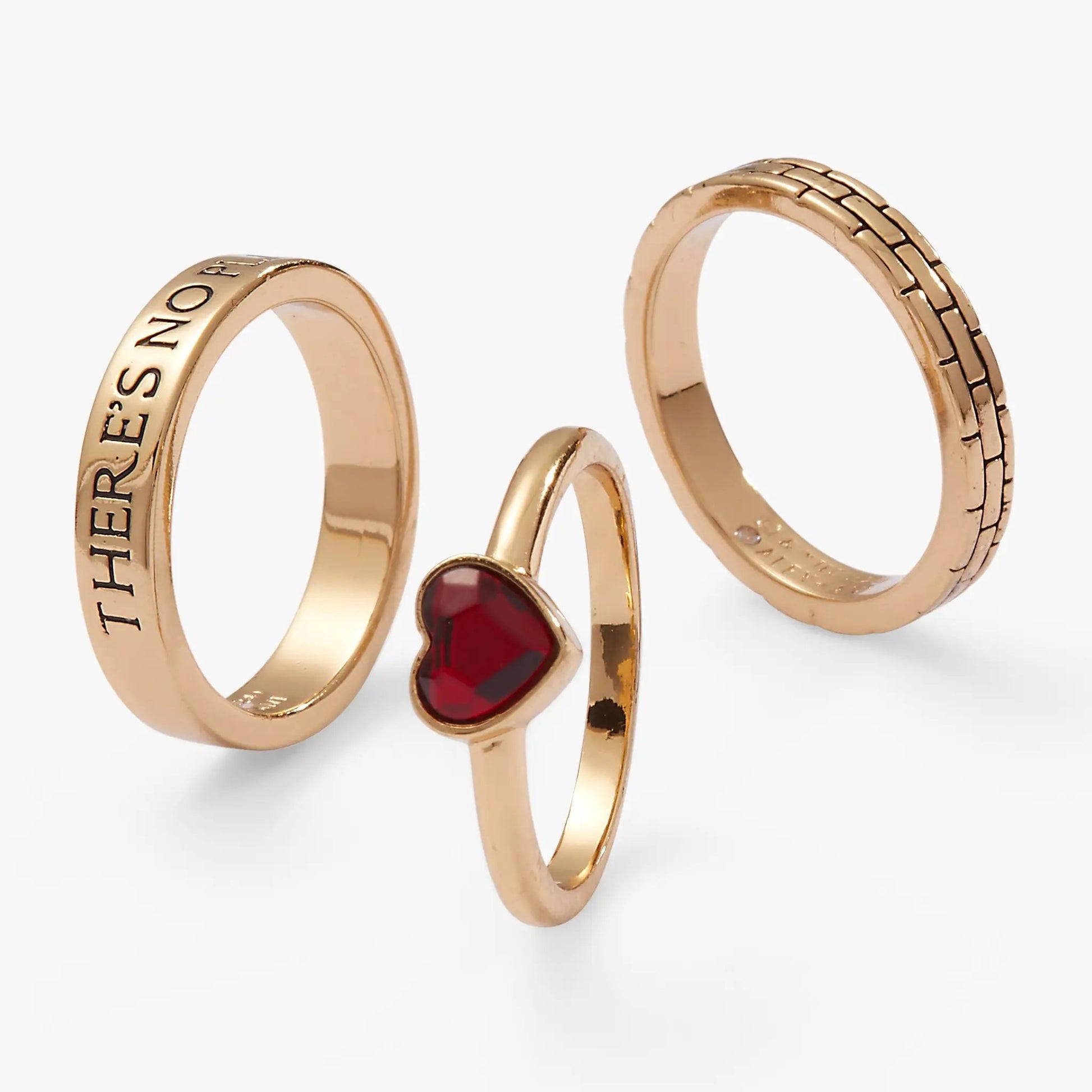 Ring set of 3 in rose gold with There’s No Place Like Home engraving and red gemstone on Tampa Home & Garden Store