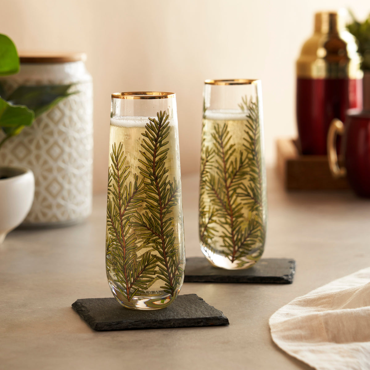 Woodland stemless champagne flute set with pine branch design in clear glass on Tampa Home & Garden Store