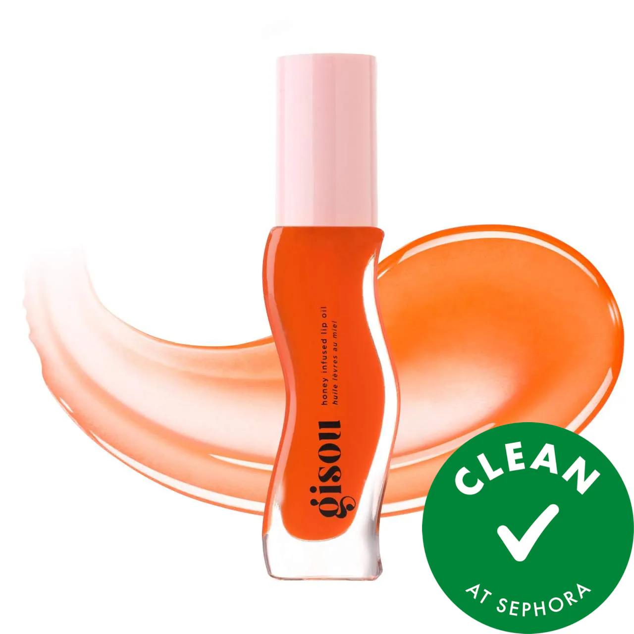 Gisou Hydrating Lip Oil bottle with orange liquid and pink cap, cruelty-free lip gloss on Tampa Home & Garden Store