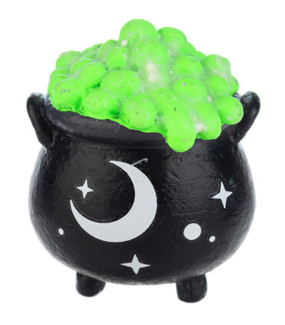 Charm de bolsillo que brilla en la oscuridad con forma de caldero de bruja