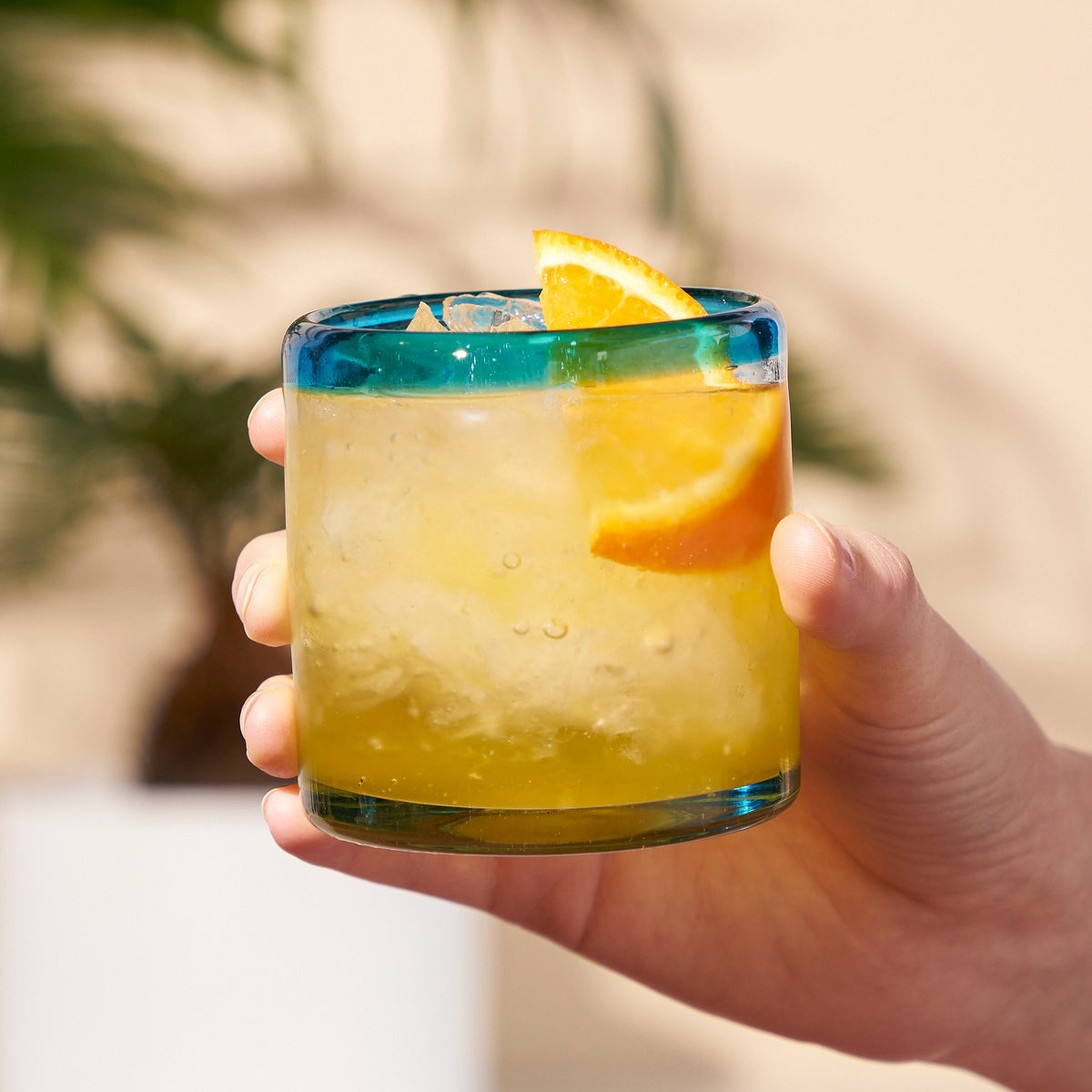 Segunda Vida Primavera short tumbler by Twine Living with blue rim and orange slice on Tampa Home & Garden Store